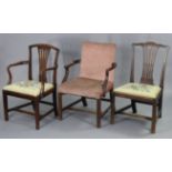 A Gainsborough-style elbow chair with a padded seat & back, & on square chamfered legs with plain