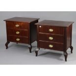 A pair of regency-style mahogany small chests each fitted three long drawers with brass swing