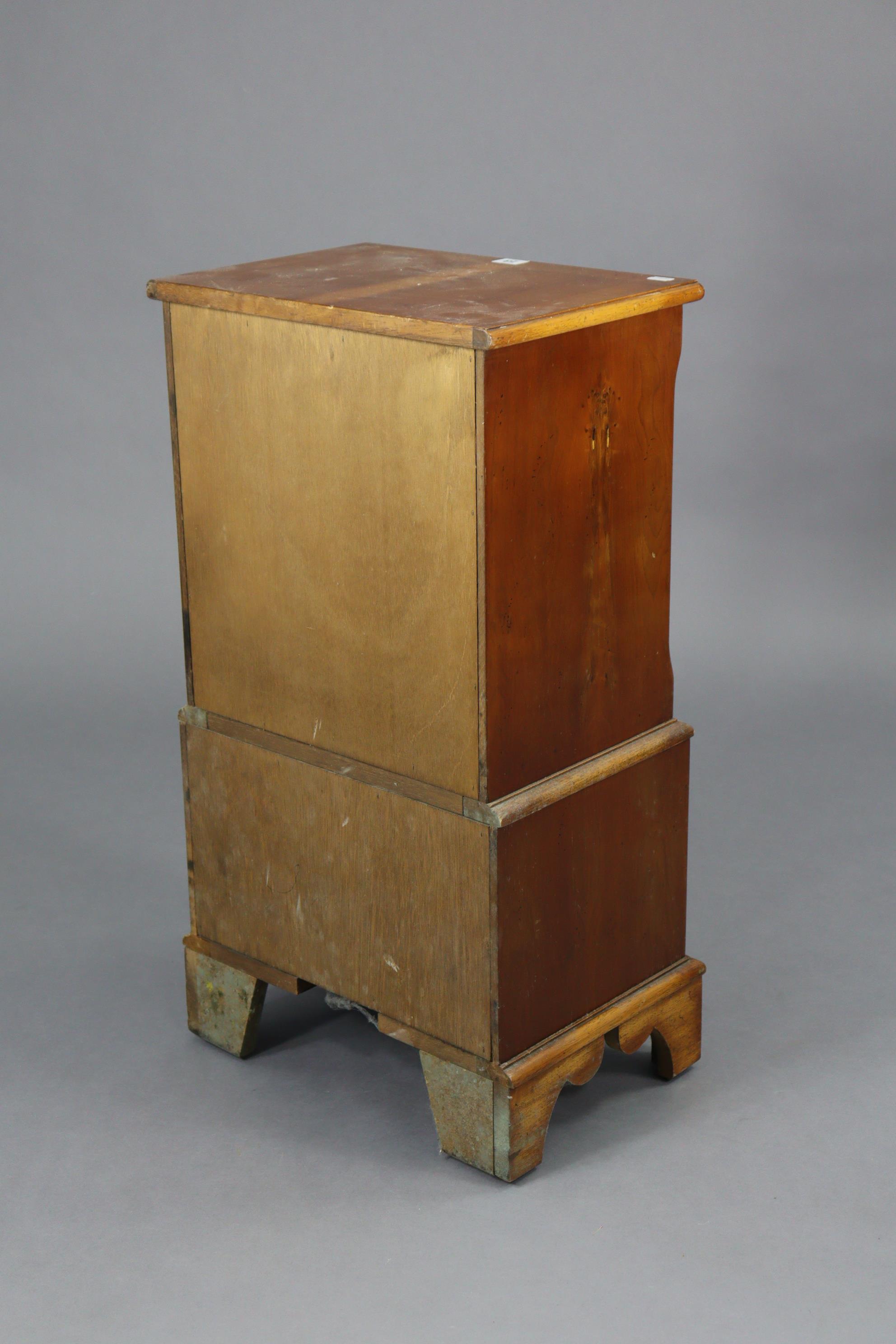 A reproduction yew wood small chest-on-chest fitted with an arrangement of four short & four long - Image 4 of 4