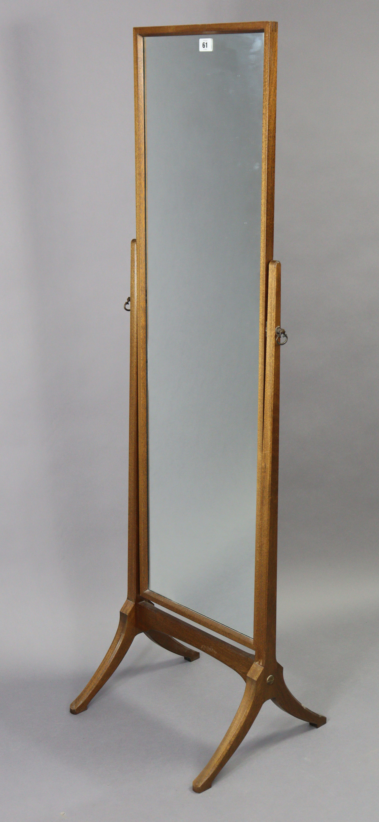 A Guild of Craftsmen mahogany rectangular cheval mirror on square tapered supports & splay legs,