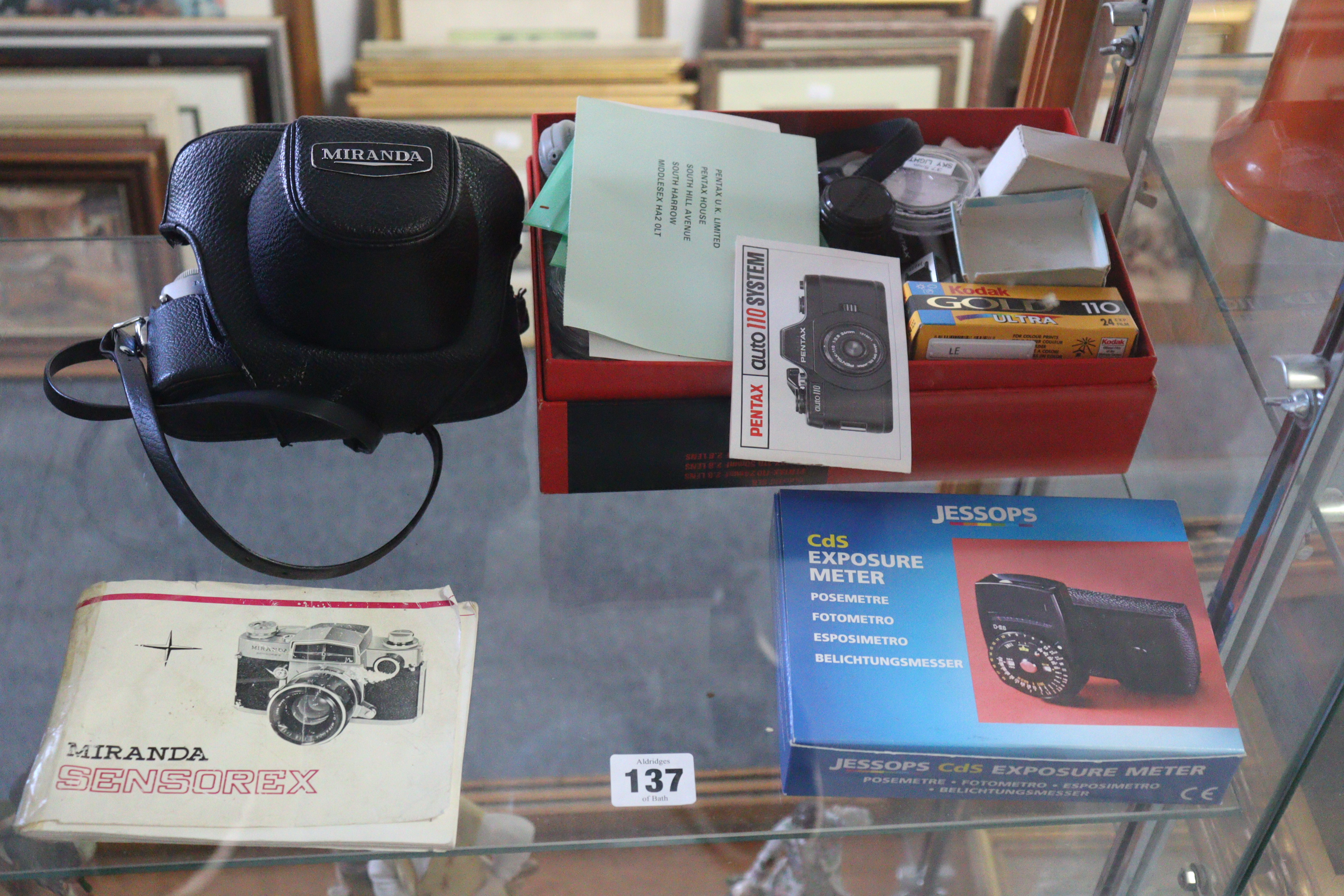 A Miranda “Sensorex” 50mm camera, with case; & a Pentax “Auto 110” camera, with various accessories,