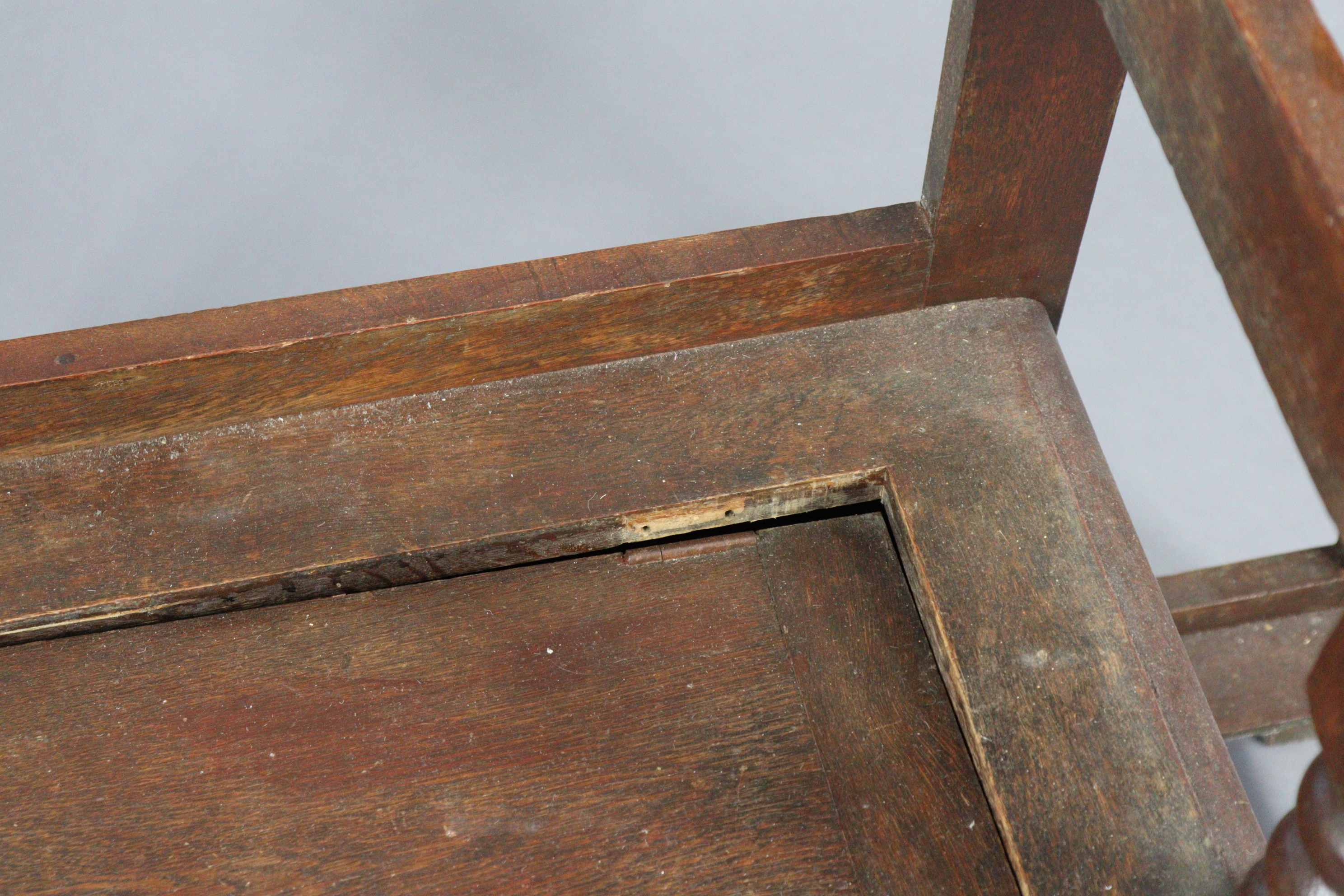 A 1930’s carved oak hall stand inset bevelled rectangular mirror to top, with a hinged box seat & - Image 3 of 7