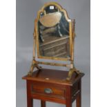 A mahogany rectangular swing toilet glass on turned supports & cabriole legs, 16” wide x 24” high; &