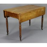 A 19th century mahogany drop-leaf dining table on four turned legs with brass castors, 43¾” wide x