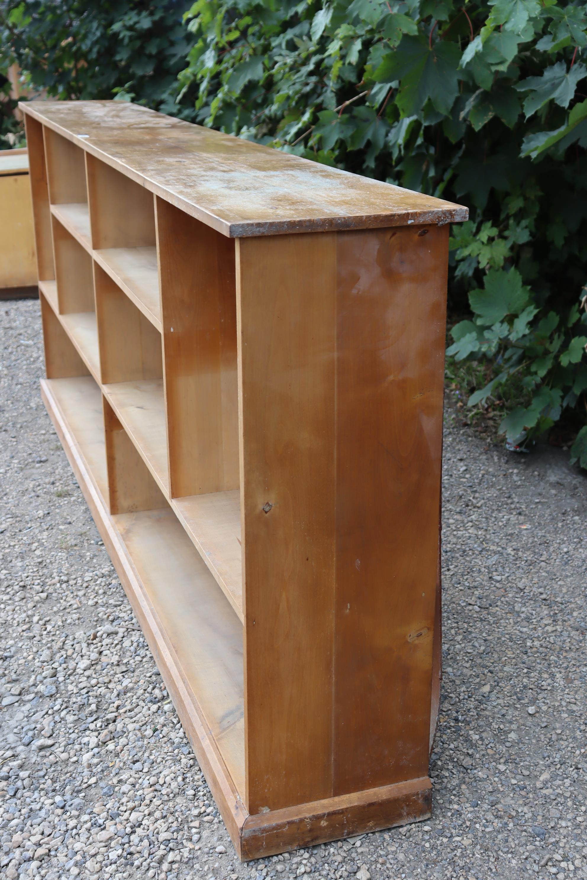 An elm dwarf standing long open bookcase with eight divisions, & on a plinth base, 97” long x 39” - Image 5 of 5