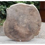 A Mulberry wood(?) rustic circular coffee table top, 43½” diameter x 5¾” deep.