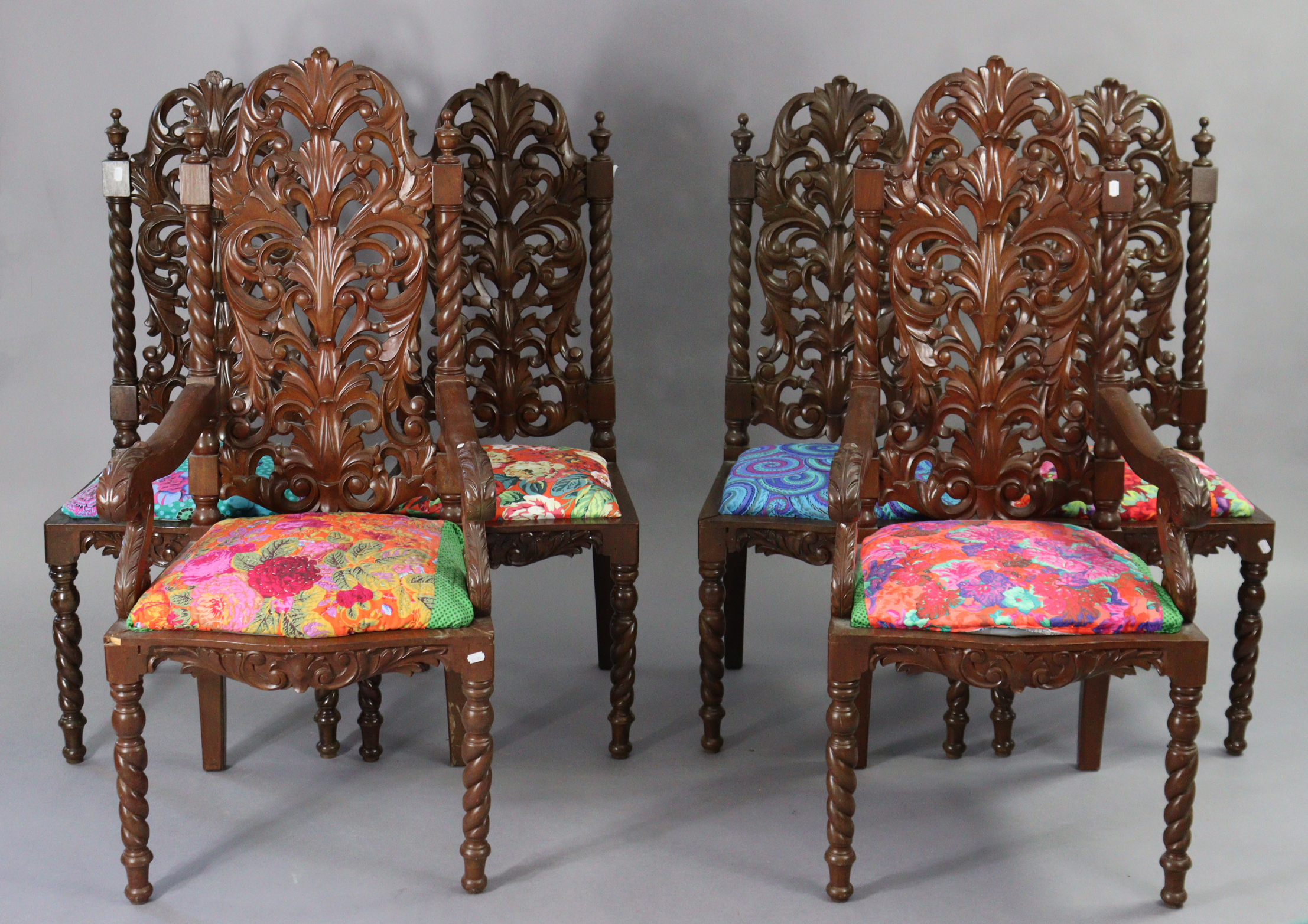 A set of six Carolean-style hardwood dining chairs (including a pair of carvers), each with a