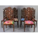 A set of six Carolean-style hardwood dining chairs (including a pair of carvers), each with a