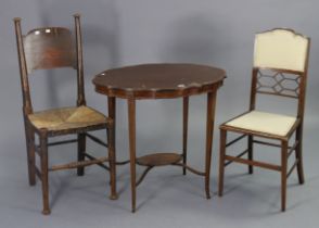 An Edwardian inlaid-mahogany oval two-tier occasional table on four square tapered legs, 30” wide
