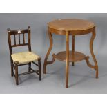 A child’s spindle-back chair with a rush seat & on turned legs with spindle stretchers, & an