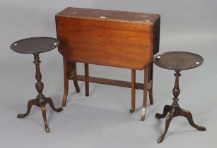 An Edwardian mahogany Sutherland table with canted corners to the rectangular top, & on square legs,