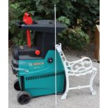 A Bosch “AXT 25 D” electric garden shredder, & a pair of white painted cast-iron garden bench