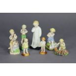 Six various Royal Worcester porcelain figures modelled by F.G. Doughty, titled “My Favourite”, “A