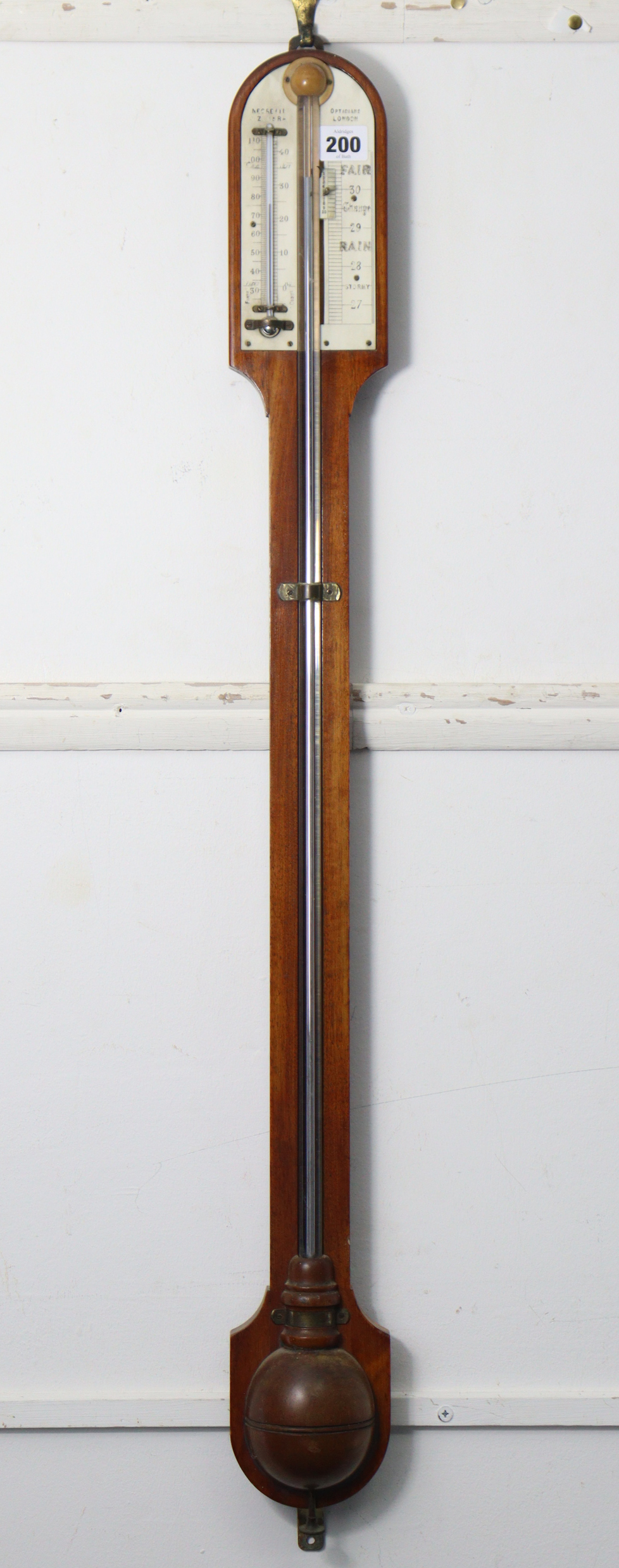 A 19th century Negretti & Zambra of London mahogany stick barometer, 36” high.