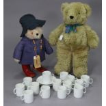 A Paddington Bear soft toy, 16” high; a modern teddy bear, 25” high; & a Thomas of Germany white