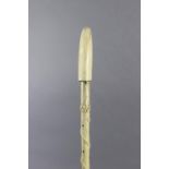Another antique carved whale bone gent’s walking cane, 29¾” long.