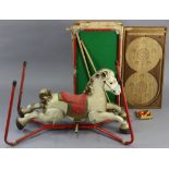 A vintage Mobo “Prairie King” lithographed tin plate rocking horse, 39” wide; together with a Milbro