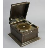 A Columbia “Grafonola” table-top gramophone in an oak case, 17½” wide.