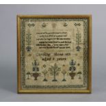 A 19th century needlework sampler worked by Caroline Stone in 1831, Aged 9 Years, 14¼” x 13½”, in