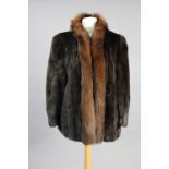 A mink silk-lined ladies coat (size 48).