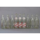 Fifteen various vintage glass bottles including “Pepsi cola” (x3), “coca cola”, “courage Brown Ale”,