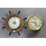 A ship’s brass-cased bulkhead clock, 7½” diameter, w.a.f.; & a Schatz ship’s barometer 13½”