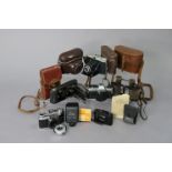 A pair of Kershaw black lacquered field glasses with case; together with five various cameras; &