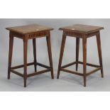 A pair of joined oak occasional tables, each with moulded edge to the rectangular top, pierced friez