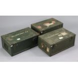 Three green painted metal British military travelling trunks, each 24½” wide x 10” high.