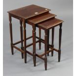 An Edwardian inlaid-mahogany nest of three rectangular occasional tables each table on four square