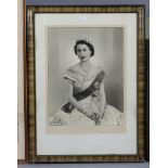 A portrait photograph of Queen Elizabeth II after Dorothy Wilding, 28.75 inches X 21.5 inches (with