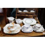 Fourteen various items of Shelley bone china teaware; & a Royal Doulton bone china floral