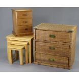 A wicker chest fitted three long drawers, 30” wide x 29¾” high; together with a pine bedside