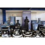 A large collection of Wedgwood blue & white jasperware, boxed & unboxed.