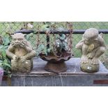 Two reconstituted stone gargoyle garden ornaments.