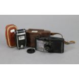 A Purma “Special” camera; & an Agfa light meter, each with case.