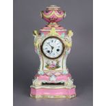 A 19th century Berlin porcelain mantel clock in pink-ground baluster form case, with urn finial &