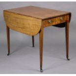 A 19th century inlaid mahogany pembroke table with rounded corners to the rectangular top, fitted