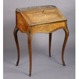 A 19th century French marquetry inlaid ladies’ bureau, with a pierced brass gallery above the