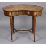 A 19th century inlaid-mahogany kidney shaped side table with gilt-tooled tan leather