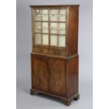 A 19th century inlaid mahogany small cabinet, fitted two shelves to the top, enclosed by pair of gla