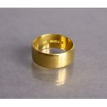 A 22ct gold plain wedding band, London hallmarks for 1969, size L, 5.2g.