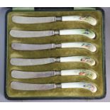 A set of six tea knives with Royal Worcester porcelain pistol-grip handles, each differently painted