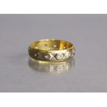 An 18ct yellow & white gold eternity ring set tiny white stones, size S, 4g.
