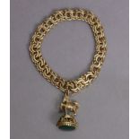 A 9ct gold flexible bracelet designed as pairs of flattened circular links, with pendant 9ct gold