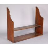 A set of mahogany two-tier hanging wall shelves, 22” wide x 18” high, together with a pair of brass
