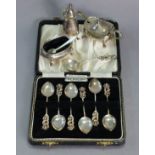 A silver small three-piece condiment set with cut-card rims, Birmingham 1964-8; & a set of six