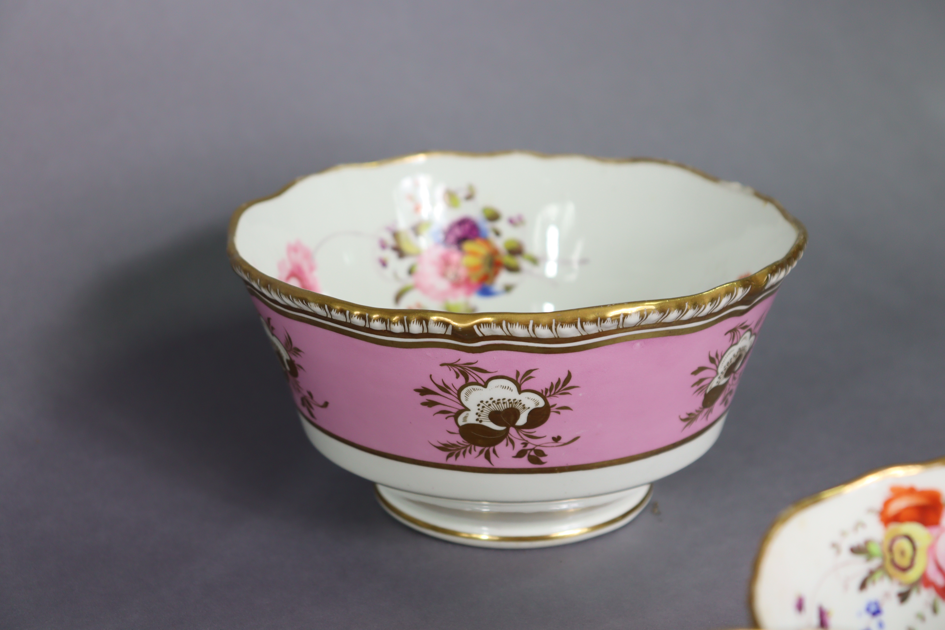 A 19th century English porcelain part tea & coffee service of pink ground with gilt banding & floral - Image 12 of 15