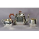 A George V silver three-piece tea service of eight-sided oblong form, Birmingham 1933 by William