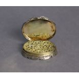 A Victorian silver vinaigrette by Nathaniel Mills, of flat oval shape with lobed border & engraved